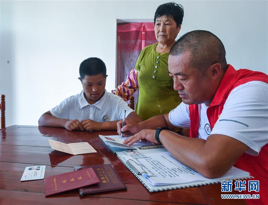 /ueditor/image/2019/08/28/16b8f85fae38054c23e9807798653038.jpeg “我为你代跑”基层党员服务乡村残疾人3.jpeg